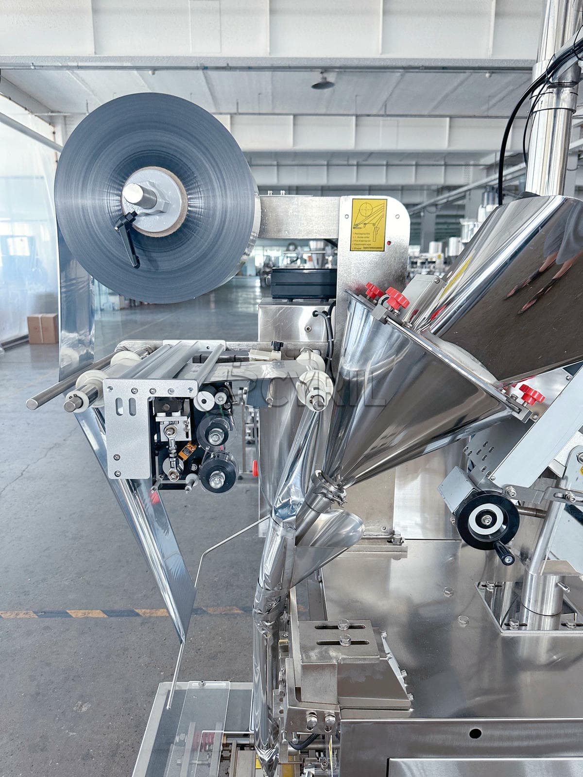 Powder packaging machine + reflective film