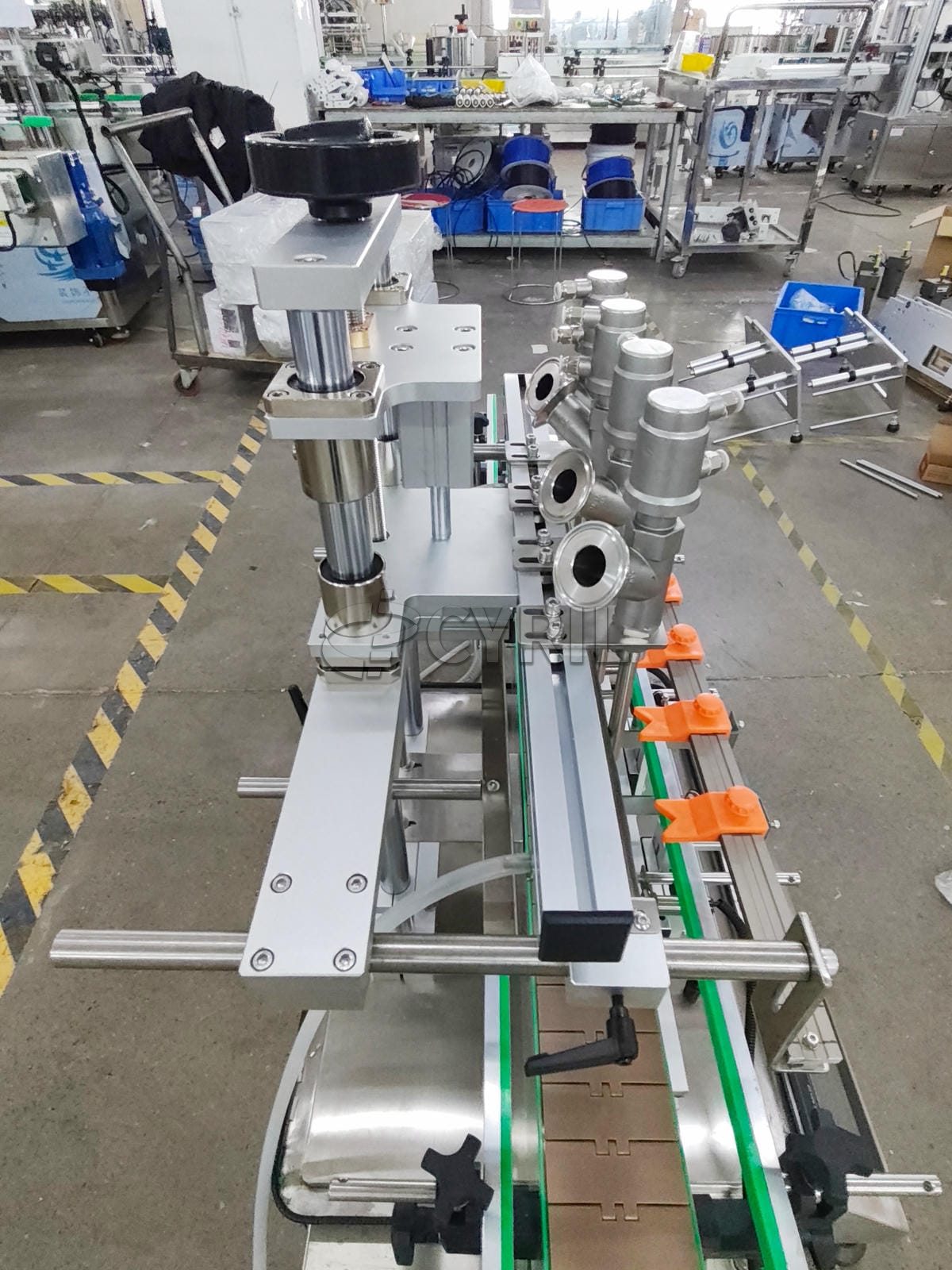Desktop four-head paste filling machine