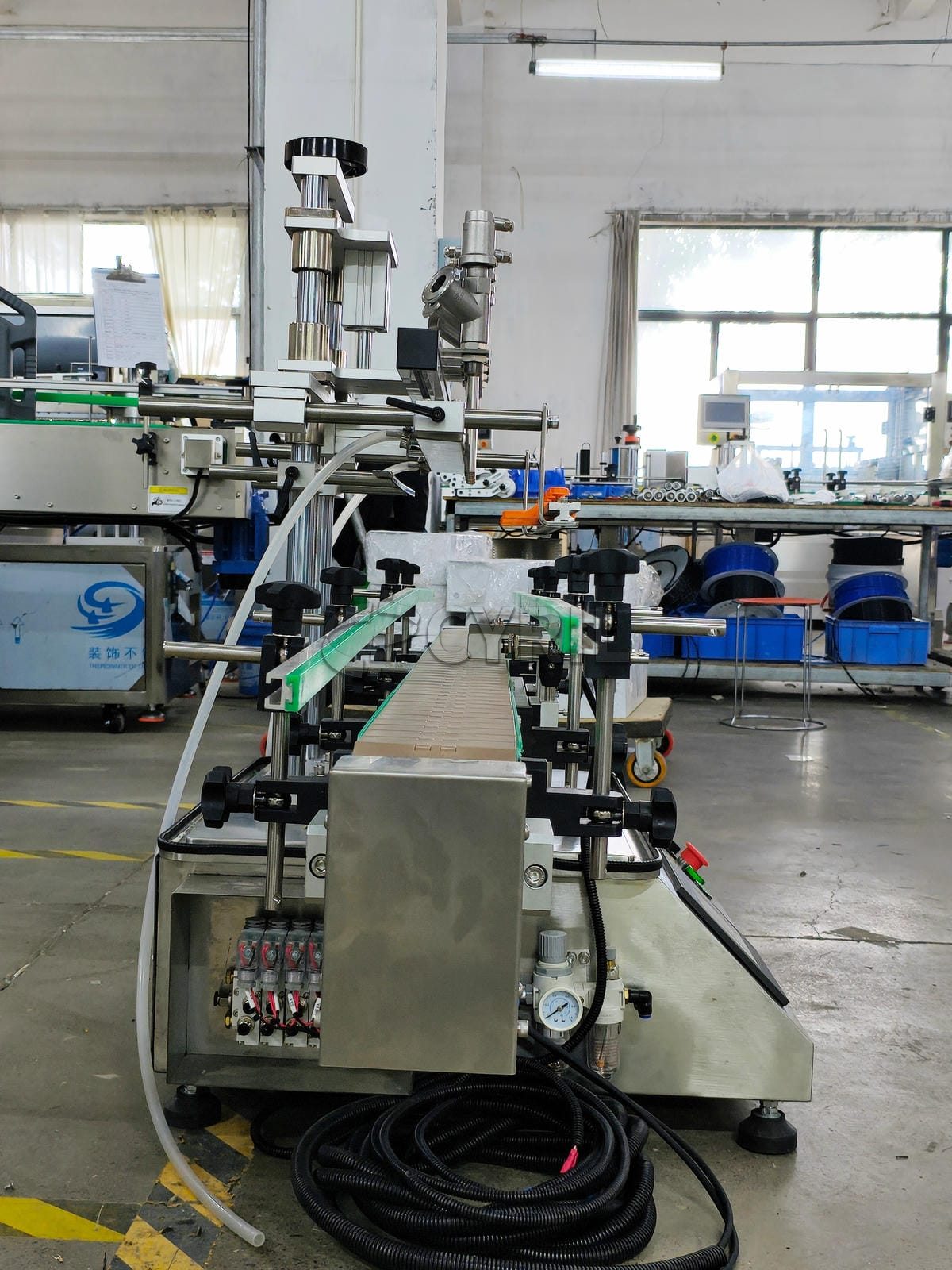 Desktop four-head paste filling machine
