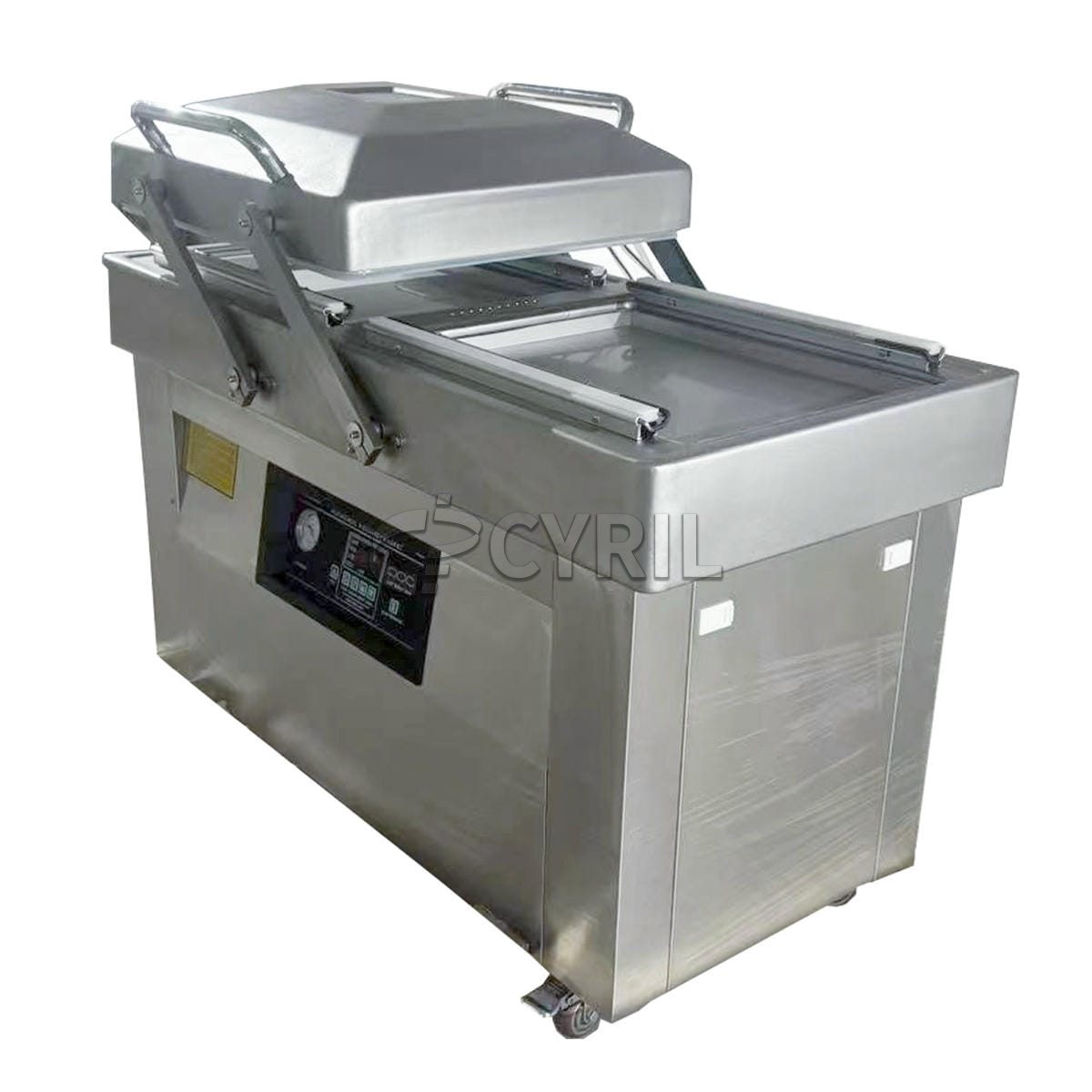 Double chamber vacuum packaging machine