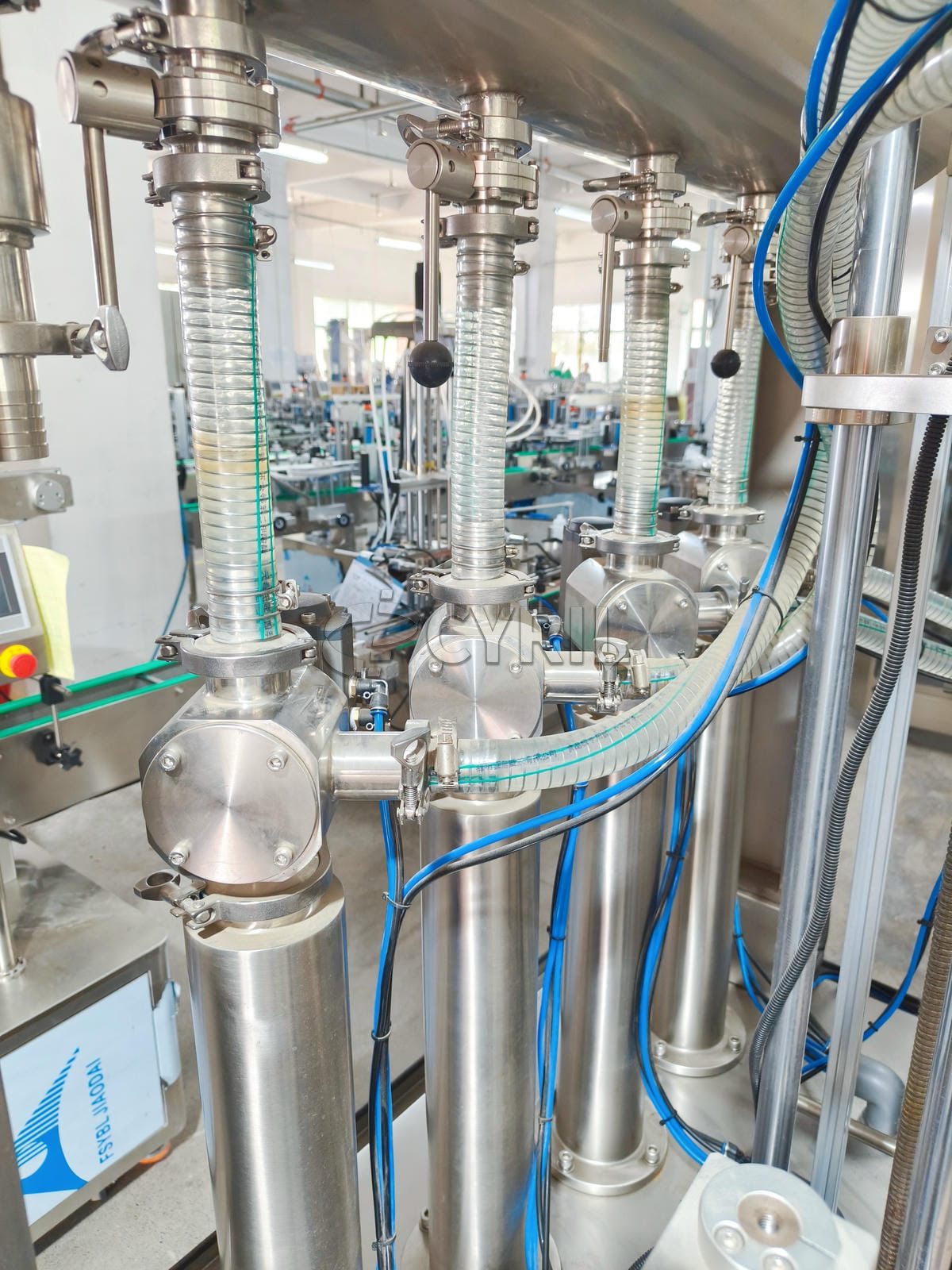 Four head paste filling machine
