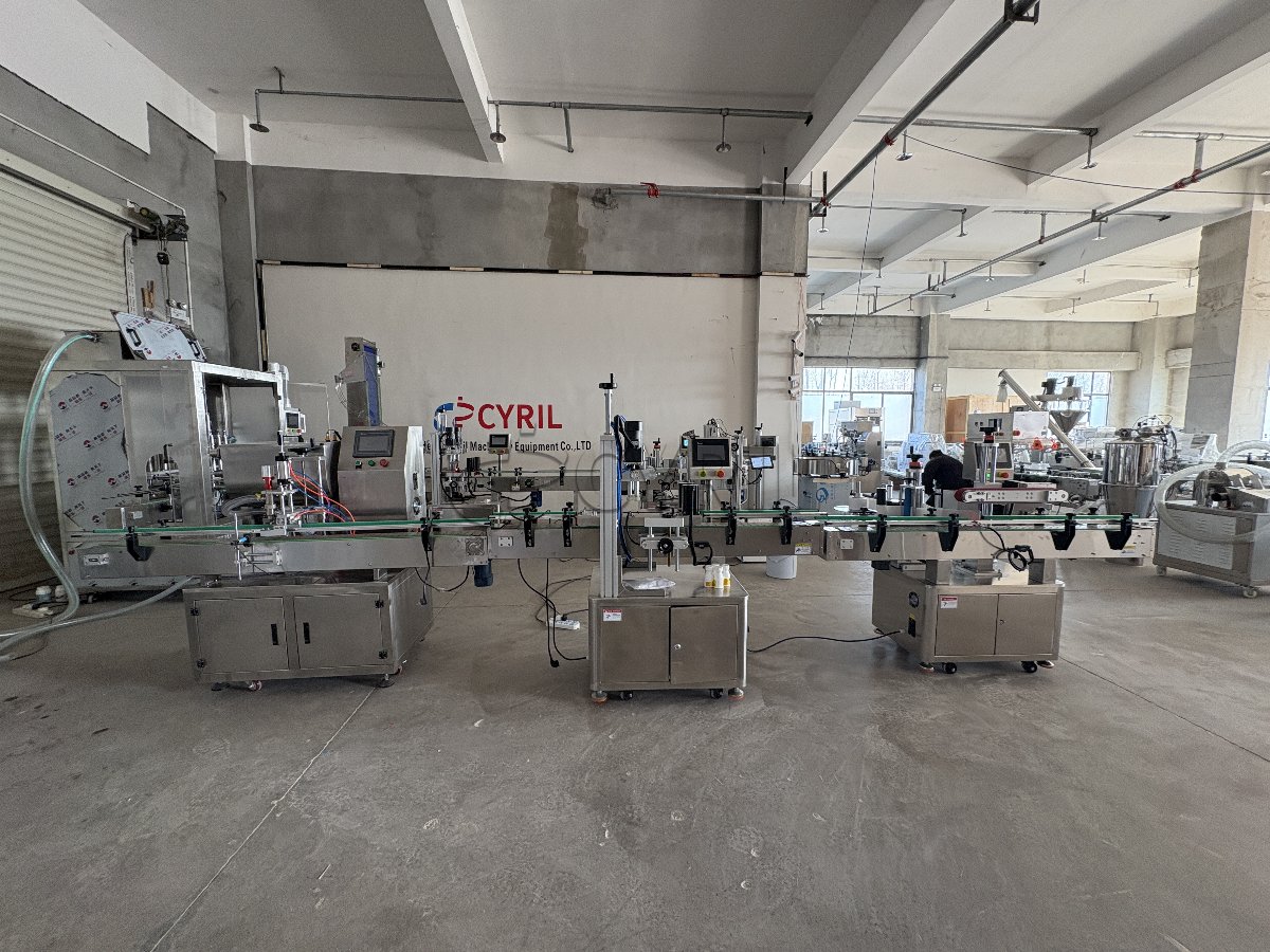 Four-head filling machine + four-wheel capping + aluminum foil sealing + round bottle positioning + laser coding + bottle sorting and collection