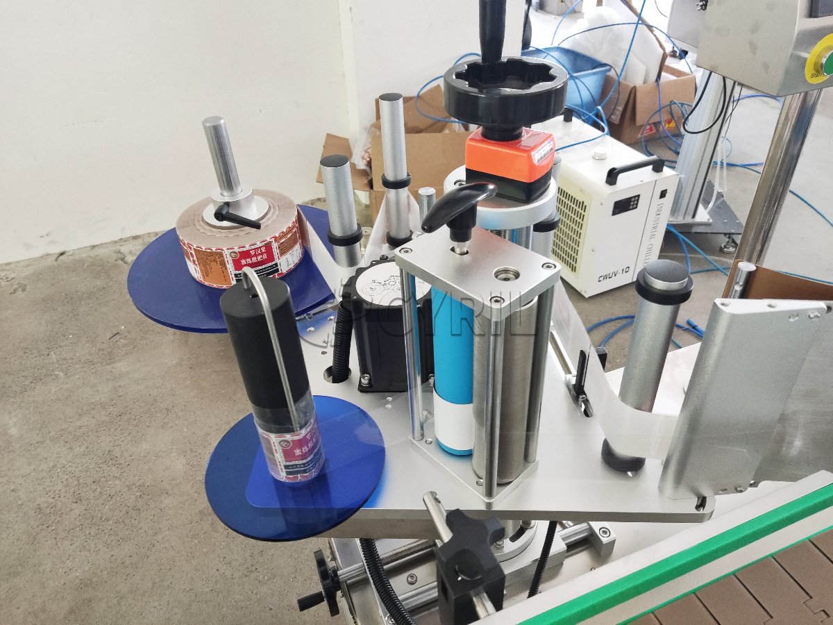 4-Head Gear Pump Filling Machine + 4-Wheel Capping Machine + Round Bottle Wrap-Around Labeling Machine