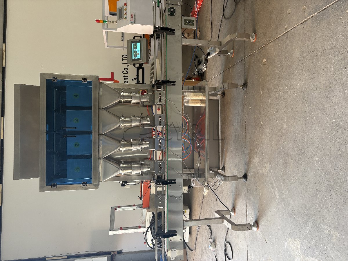 Four-head weighing filling machine with four ports + four-wheel capping + round bottle positioning