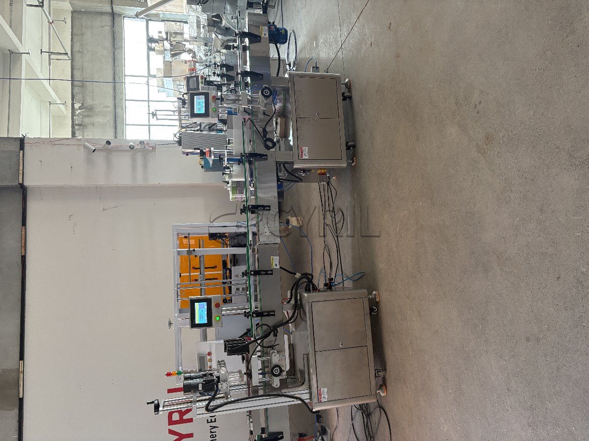 Four-head weighing filling machine with four ports + four-wheel capping + round bottle positioning