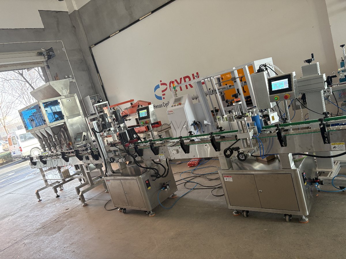 Four-head weighing filling machine with four ports + four-wheel capping + round bottle positioning