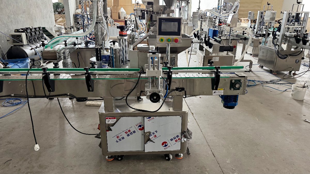 6-Head Anti-Corrosion Filling Machine + 4-Wheel Capping + Round Bottle Positioning