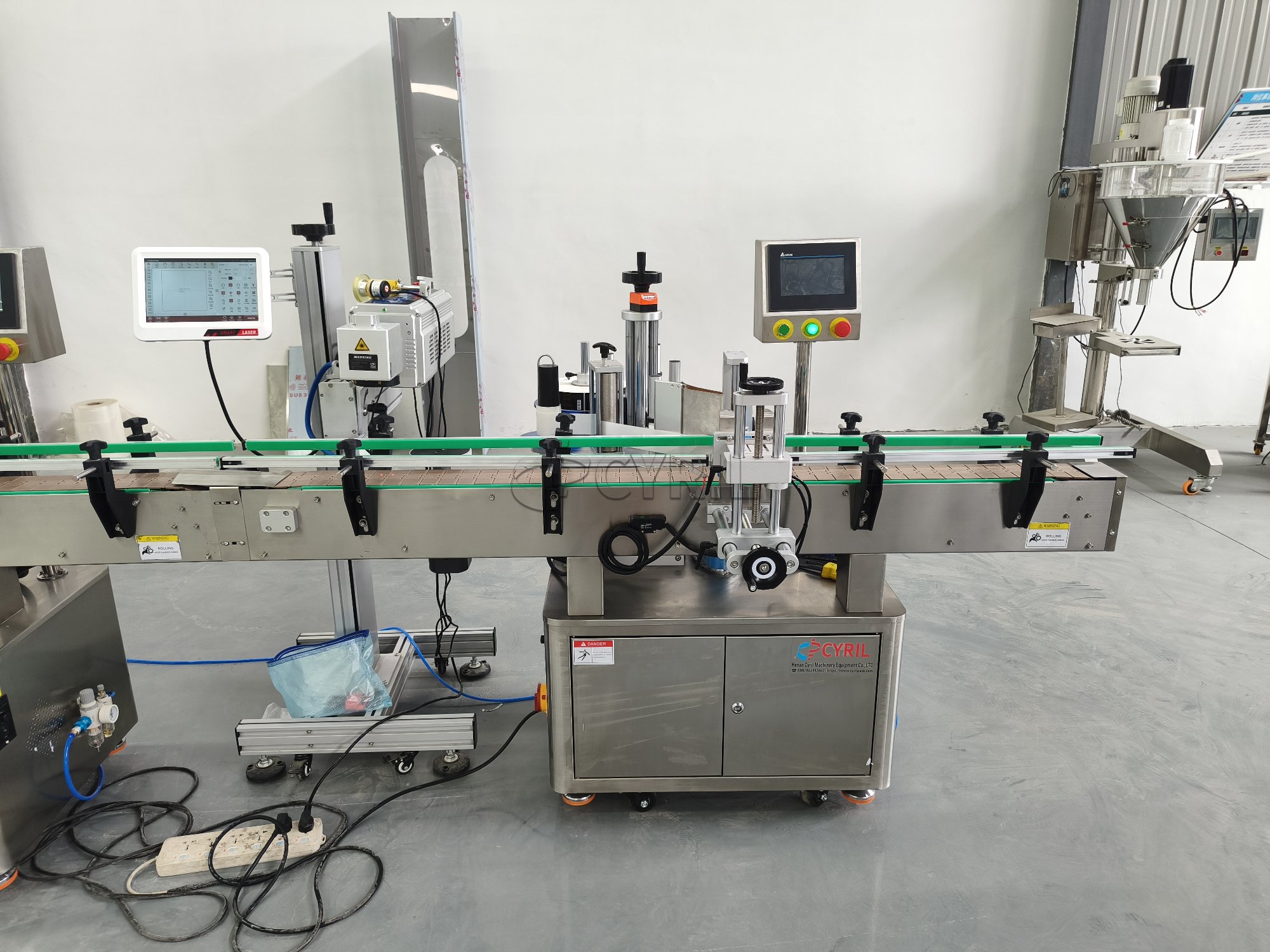 Four-head weighing filling machine + aluminum cap capping machine + single-head capping machine + laser coding machine + round bottle positioning system