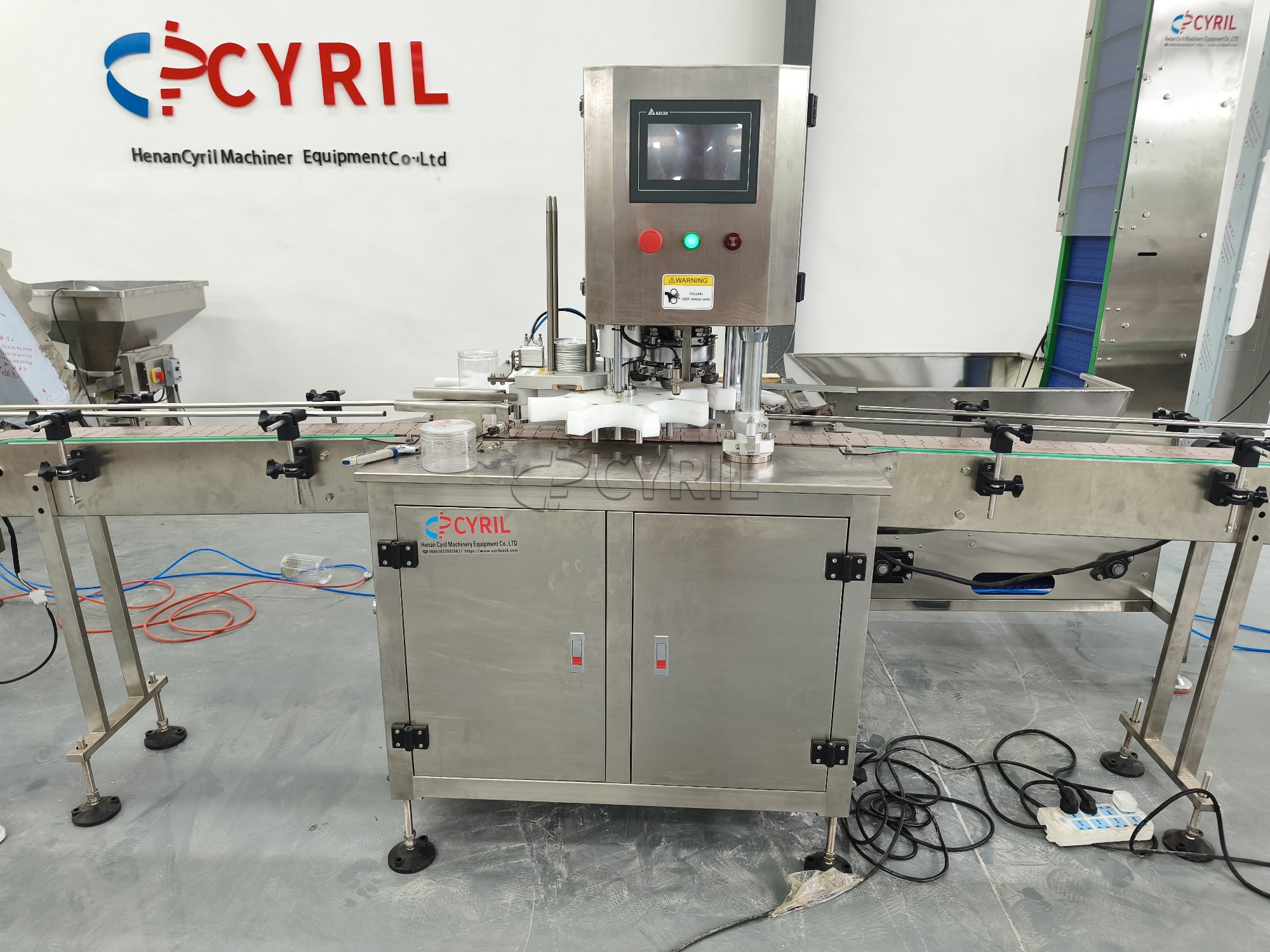Four-head weighing filling machine + aluminum cap capping machine + single-head capping machine + laser coding machine + round bottle positioning system