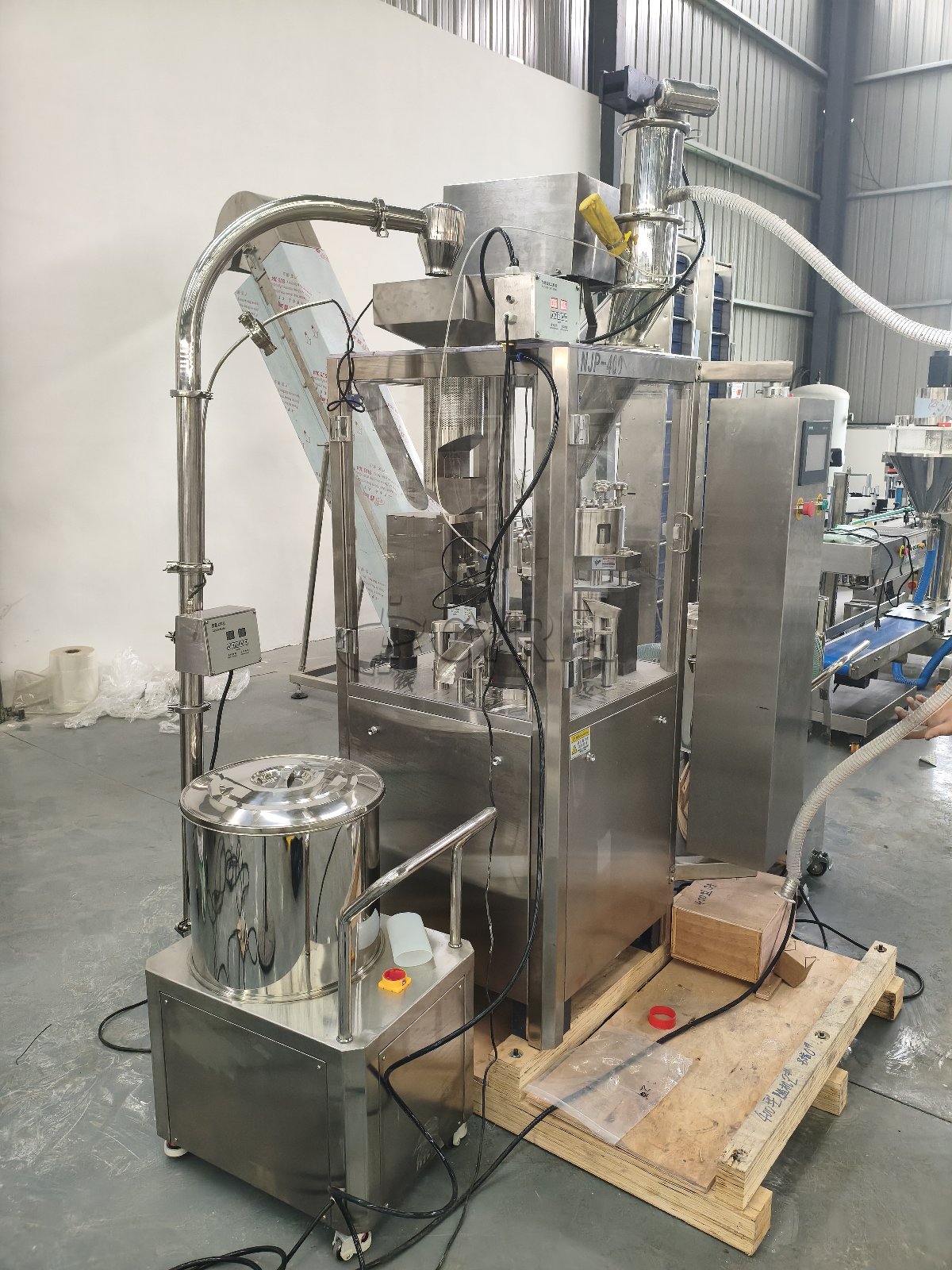 Capsule filling machine + powder feeding pump + dust collector + vacuum pump