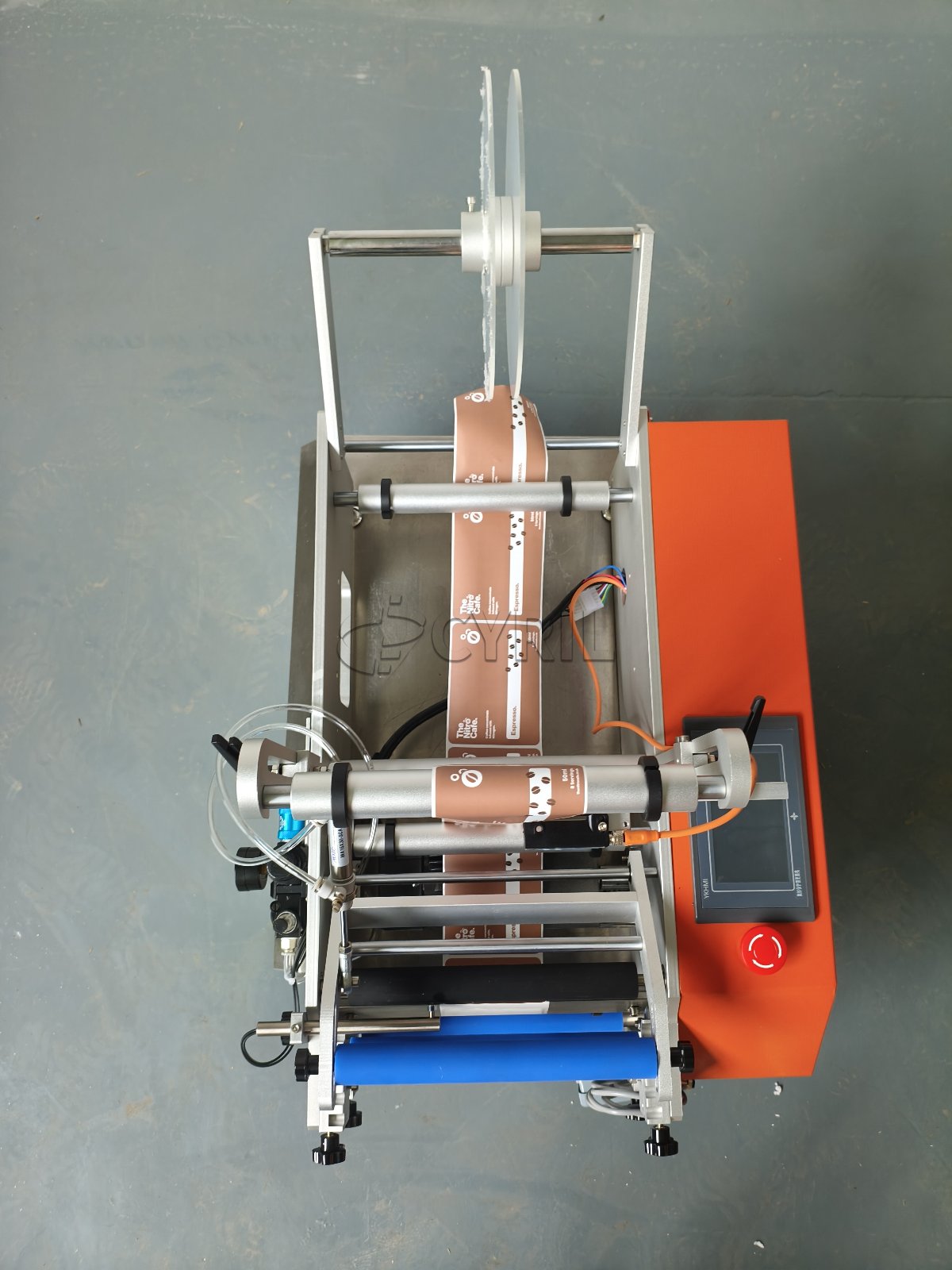 Semi-automatic round bottle labeling machine + Orange