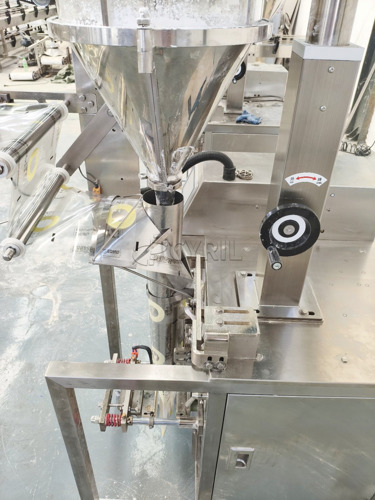 Powder packaging machine with straight-auger filling and back sealing.